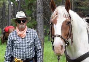 Guest with pinto horse named Duke.